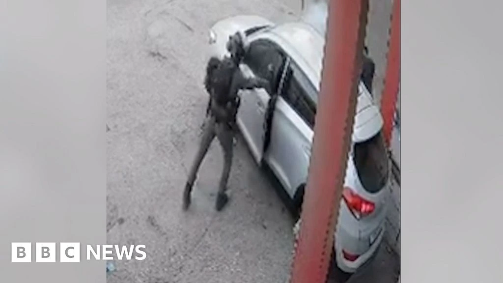 Israeli police officer filmed throwing stun grenade into car in West Bank