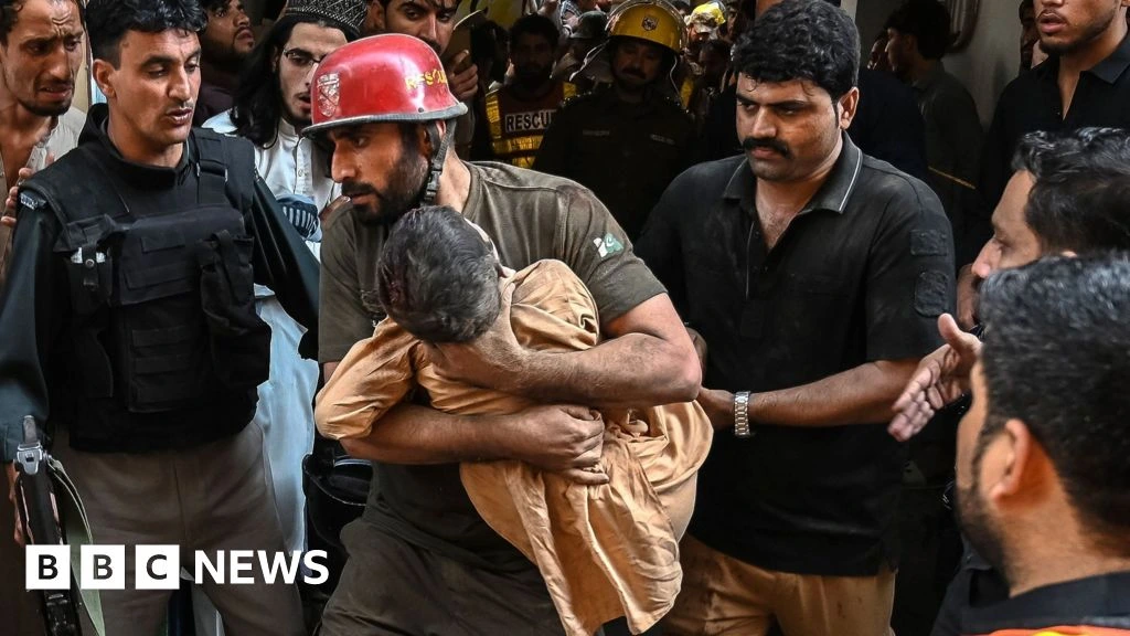 At least 33 pupils and teacher killed after school roof collapses in Pakistan